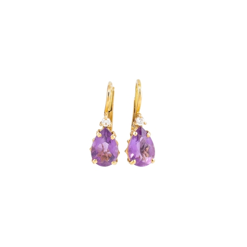 137 - A PAIR OF AMETHYST EARRINGS, together with two pairs of topaz earrings and two pendants, all mounted... 