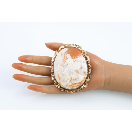 15 - AN ANTIQUE SHELL CAMEO BROOCH, 9ct gold frame