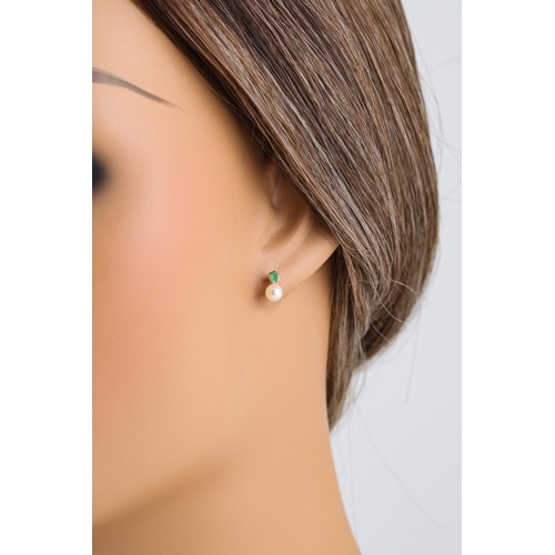 154 - A PAIR OF PEARL AND EMERALD STUD EARRINGS, mounted in gold