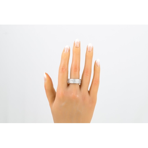 220 - A FOUR ROWED DIAMOND SET RING, mounted in 18ct white gold.  Estimated: weight of diamonds: 2.00 ct, ... 