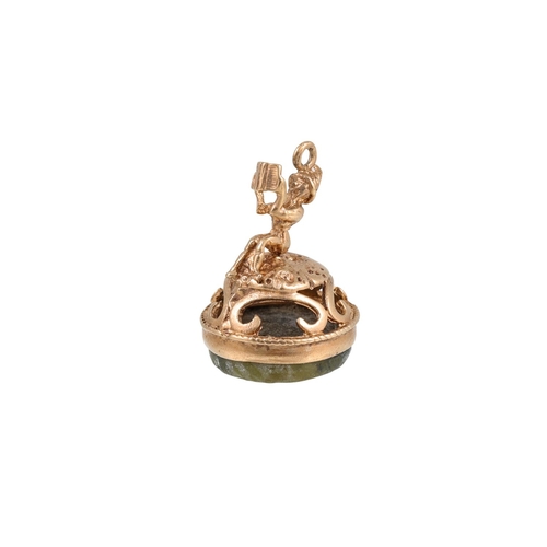 225 - AN AGATE SEAL, modelled as a Leprechaun, 9ct gold mounted