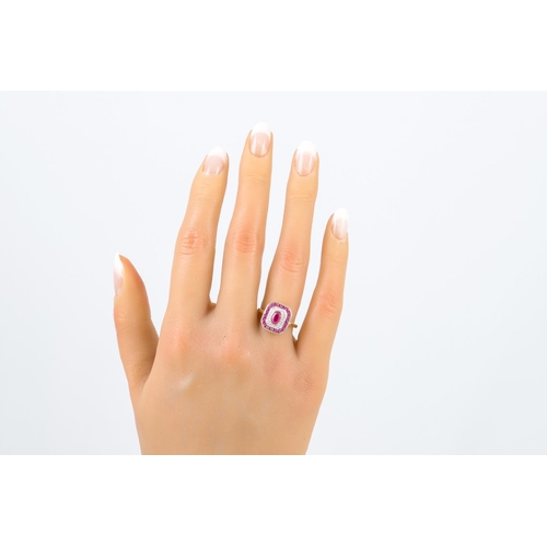 240 - A DIAMOND AND RUBY CLUSTER RING, octagonal form, mounted in 9ct gold, size M-N