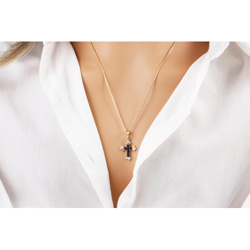 258 - A DIAMOND AND SAPPHIRE CROSS, mounted in gold, on a gold chain