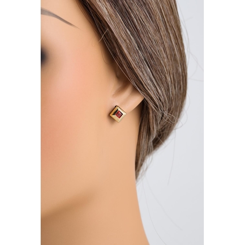 268 - A PAIR OF GARNET EARRINGS, mounted in yellow gold