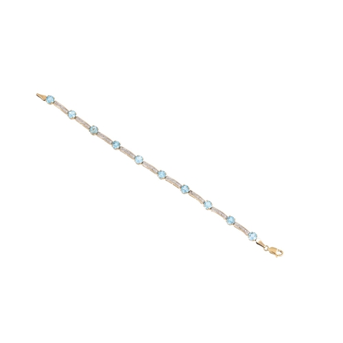 277 - A DIAMOND AND TOPAZ BRACELET, the oval topaz stones set between diamond set bars, mounted in 9ct gol... 