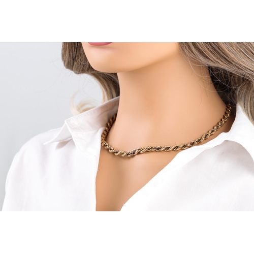 316 - A TWISTED ROPE LINK NECK CHAIN, 9ct yellow gold