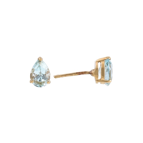 322 - AN AQUAMARINE AND TOPAZ DRESS RING, mounted in 9ct yellow gold, together with a pair of pear shaped ... 