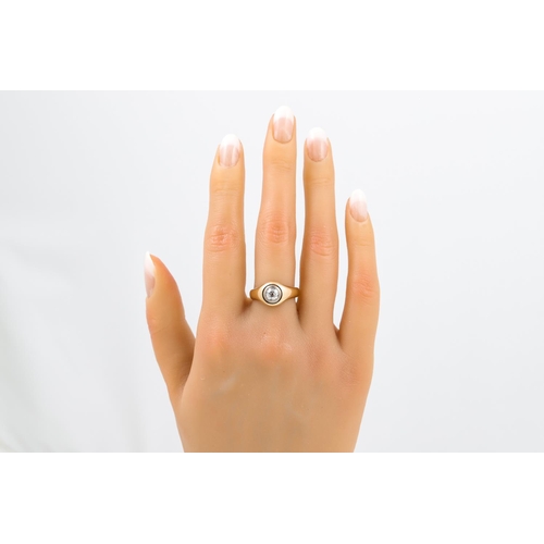 399 - A VINTAGE SOLITAIRE DIAMOND RING, the old cut diamond collet set in 18ct white and yellow gold. Esti... 