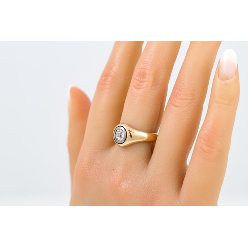 399 - A VINTAGE SOLITAIRE DIAMOND RING, the old cut diamond collet set in 18ct white and yellow gold. Esti... 