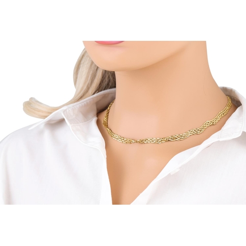 410 - A TRIPLE MESH LINK NECKLACE, mounted in 18ct yellow gold, ca 18'' long, 17.6 g., with matching brace... 