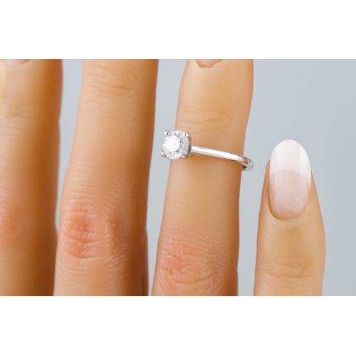 413 - A DIAMOND SOLITAIRE RING, the brilliant cut diamond mounted in 14ct white gold. Together with GIA ce... 