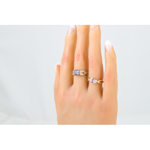 414 - TWO GEM SET DRESS RINGS, mounted in 9ct yellow gold