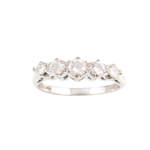 420 - A FIVE STONE DIAMOND RING, the graduated brilliant cut diamonds, mounted in 18ct white gold.  Estima... 