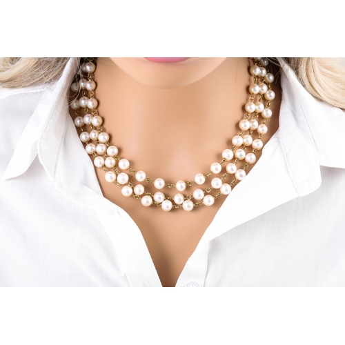 438 - A PEARL NECKLACE, the pearls set to 18ct yellow gold chain links