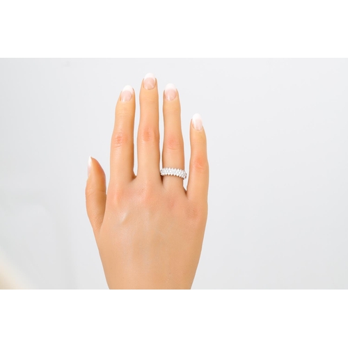 442 - A THREE ROWED DIAMOND RING, the brilliant cut diamonds mounted in 18ct white gold. Estimated: weight... 