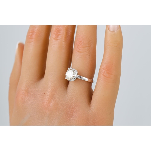 443 - A DIAMOND SOLITAIRE RING, the old cut diamond mounted in 18ct white gold. Estimated: weight of diamo... 