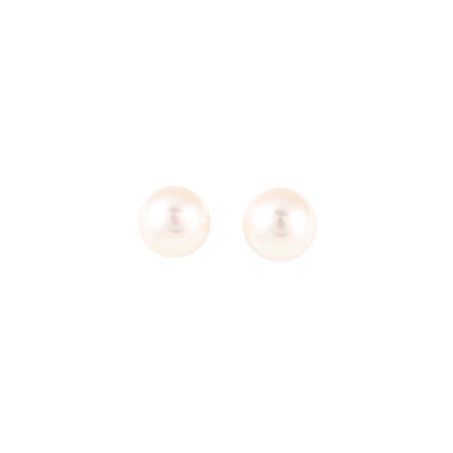 456 - A STRING OF CULTURED PEARLS, with a gold clasp and a pair of cultured pearl earrings