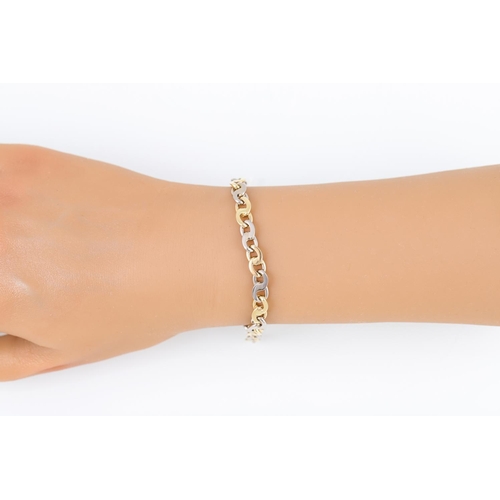 468 - A TWO TONE BRACELET, mounted in 18ct gold. ca. 26.0g