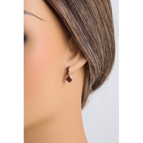 8 - A PAIR OF DIAMOND AND GARNET DROP EARRINGS, square form mounted in gold