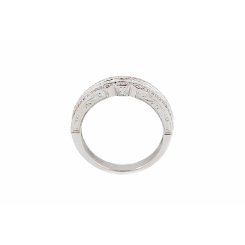 422 - A DIAMOND SET BAND RING, set with baguette and round brilliant cut stones mounted in 18ct white gold... 