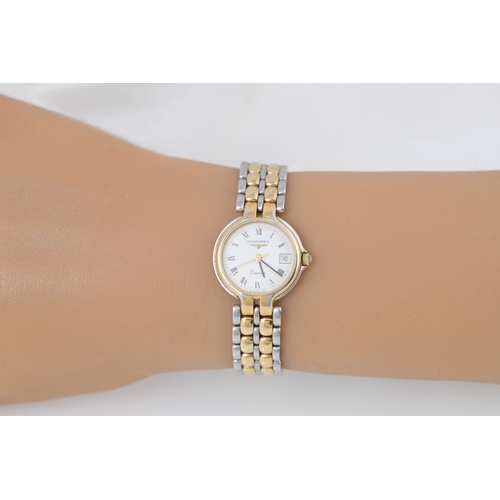 457 - A LADY'S STAINLESS STEEL LONGINES WRIST WATCH,  bracelet strap