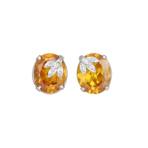 106 - A PAIR OF DIAMOND AND CITRINE EARRINGS, mounted in white gold