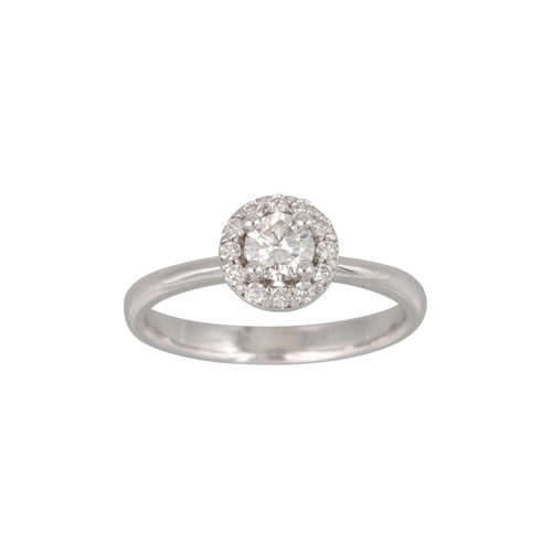 152 - A DIAMOND CLUSTER RING, the brilliant cut diamonds mounted in 18ct white gold. Estimated: weight of ... 