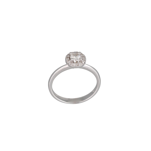 152 - A DIAMOND CLUSTER RING, the brilliant cut diamonds mounted in 18ct white gold. Estimated: weight of ... 