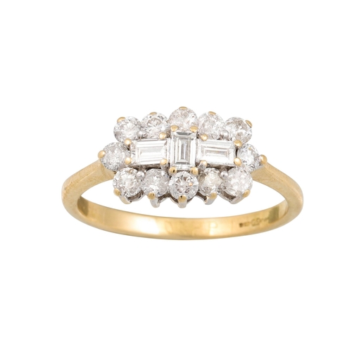 165 - A DIAMOND CLUSTER RING, set with baguette and brilliant cut diamonds mounted in 18ct gold. Estimated... 