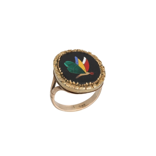 184 - A PIETRA DURA RING, depicting a butterfly, mounted in gold. Size: J