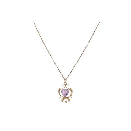 189 - A LATE VICTORIAN 9CT GOLD AMETHYST AND PEARL PENDANT, the heart shaped amethyst within a pearl surro... 