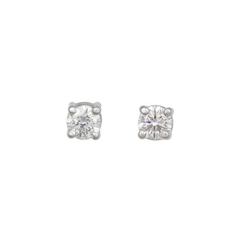 199 - A PAIR OF DIAMOND STUD EARRINGS, the brilliant cut diamonds mounted in 18ct white gold. Estimated: w... 