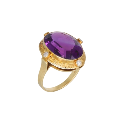 2 - AN AMETHYST AND DIAMOND RING, to a diamond point surround, mounted in 14ct yellow gold, size N