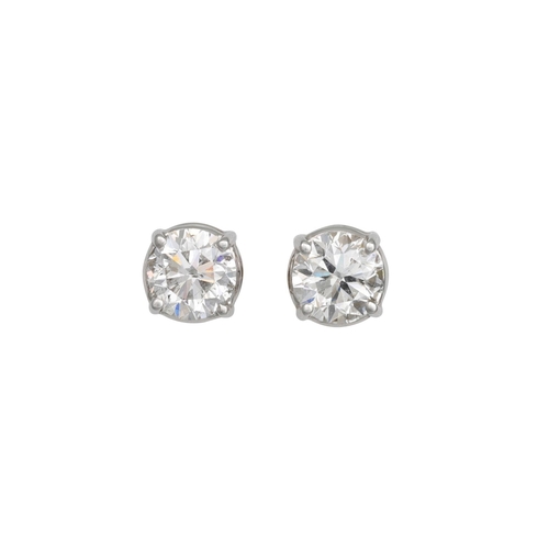 200 - A PAIR OF DIAMOND STUD EARRINGS, the round brilliant cut diamonds mounted in 18ct white gold. Estima... 