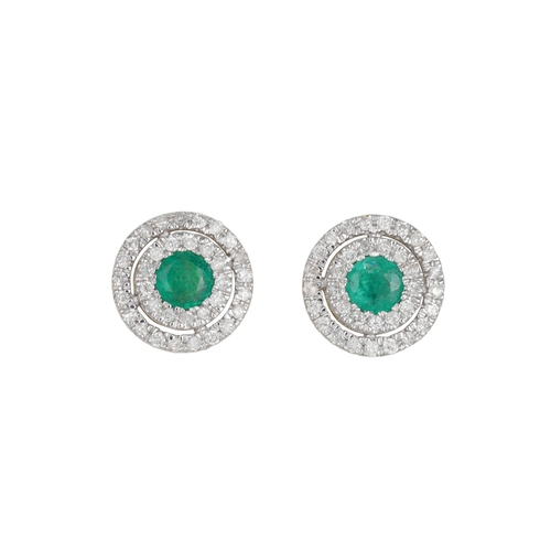 21 - A PAIR OF DIAMOND AND EMERALD TARGET EARRINGS, the circular emeralds to two rowed diamond surrounds,... 