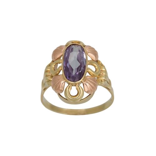 235 - A VINTAGE SAPPHIRE RING, the oval stone to a two colour carved 14 ct gold mount, size W