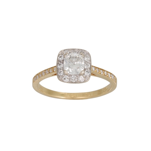 256 - A DIAMOND HALO CLUSTER RING, mounted in 18ct yellow gold. Estimated: weight of centre diamond: 0.62 ... 