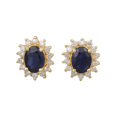 281 - A PAIR OF SAPPHIRE AND DIAMOND CLUSTER EARRINGS, the oval sapphires to brilliant cut diamond surroun... 