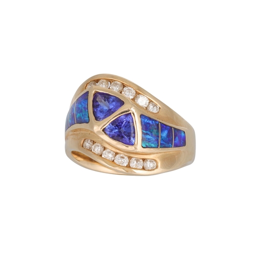 284 - A TANZANITE, OPAL AND DIAMOND DRESS RING, trillion cut tanzanites to opal shoulders, and round brill... 