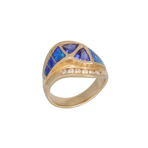 284 - A TANZANITE, OPAL AND DIAMOND DRESS RING, trillion cut tanzanites to opal shoulders, and round brill... 