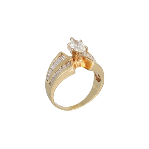 287 - A DIAMOND SET RING, the marquise cut diamond to channel set baguette cut diamond shoulders, mounted ... 