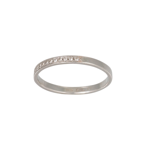 302 - A HALF ETERNITY DIAMOND RING, mounted in platinum, size K