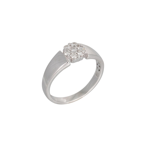 329 - A DIAMOND CLUSTER RING, the brilliant cut diamonds mounted in 14ct white gold. Estimated: weight of ... 