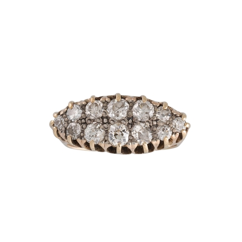 336 - AN ANTIQUE DIAMOND CLUSTER RING, set with twelve old cut diamonds to a carved yellow gold mount. Est... 