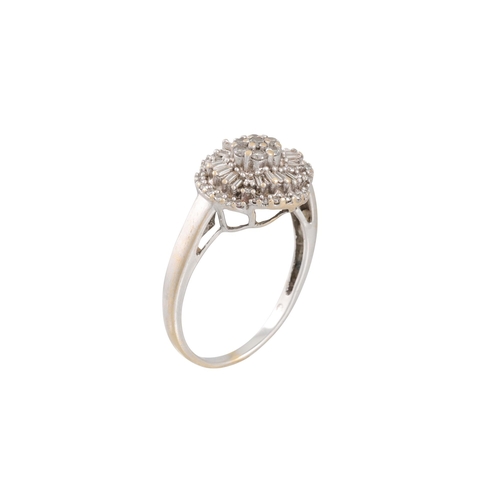 337 - A DIAMOND CLUSTER DRESS RING, set with round brilliant cut and tapered baguette cut diamonds, mounte... 