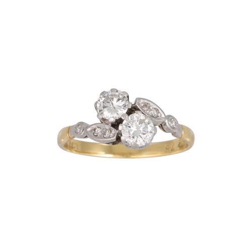 339 - A VINTAGE TWO STONE DIAMOND RING, of cross over design to diamond shoulders, mounted in 18ct yellow ... 