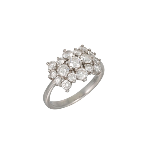 340 - A DIAMOND CLUSTER RING, the brilliant cut diamonds set in a shaped panel, mounted in 18ct white gold... 