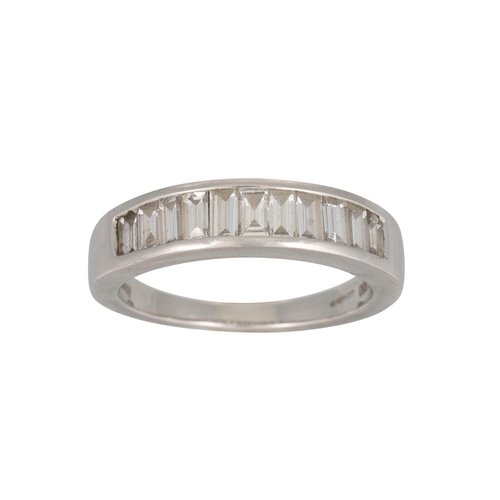 342 - A DIAMOND HALF ETERNITY RING, channel set with baguette diamonds, mounted in 18ct white gold, togeth... 