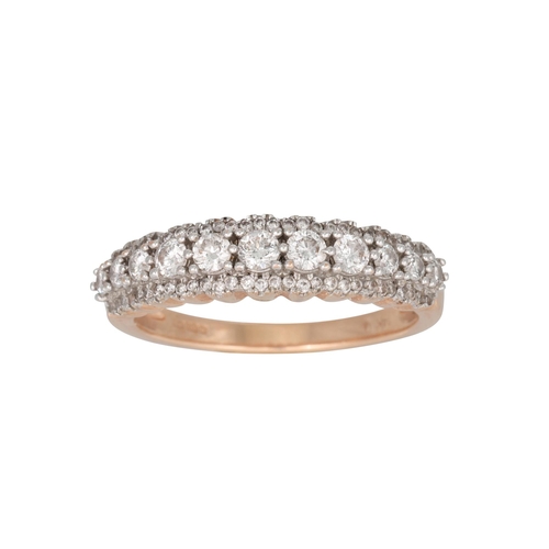 348 - A DIAMOND THREE ROWED RING, the brilliant cut diamonds mounted in 14ct yellow gold. Estimated: weigh... 