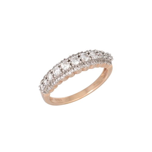 348 - A DIAMOND THREE ROWED RING, the brilliant cut diamonds mounted in 14ct yellow gold. Estimated: weigh... 